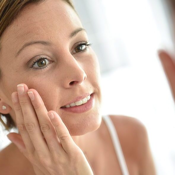 Young Woman Washing Her Face